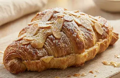 Almond Croissant - Filled with frangipane, topped with toasted almonds.