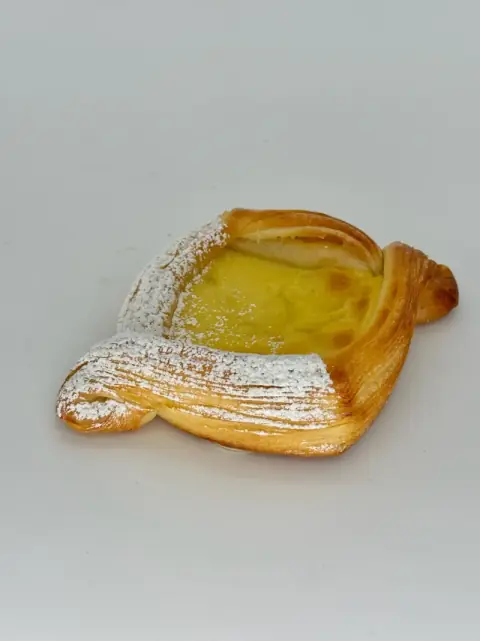 Baked Custard Danish - Golden, flaky pastry cradling smooth vanilla custard, baked until delicately set and lightly caramelized on top. Soft, creamy, and irresistibly comforting.