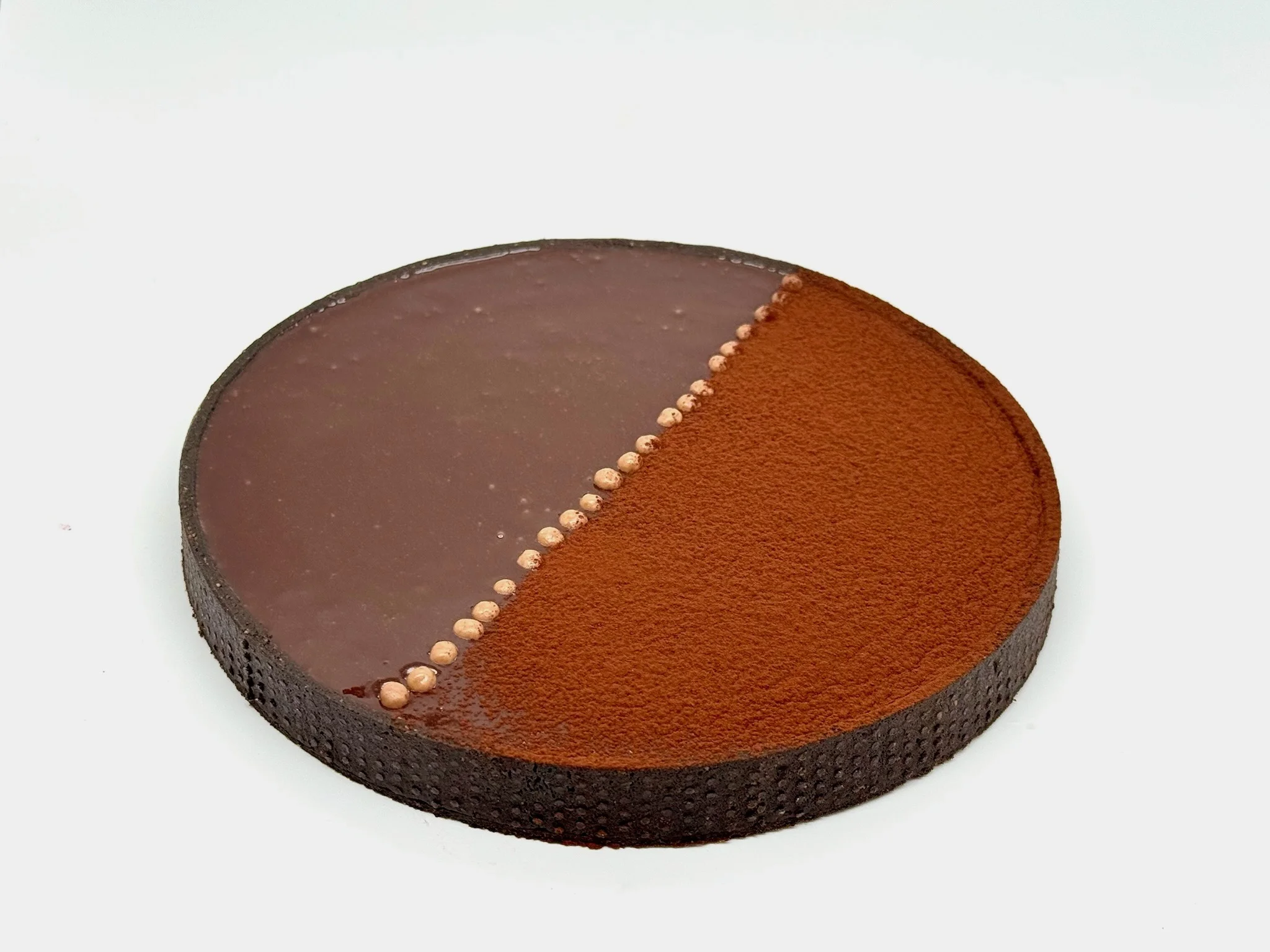 Big Milk Chocolate Tart - Buttery tart shell filled with silky, smooth milk chocolate cream — rich and indulgent without being heavy. A crowd-pleasing classic that melts with every bite. Serves 6–8 people.