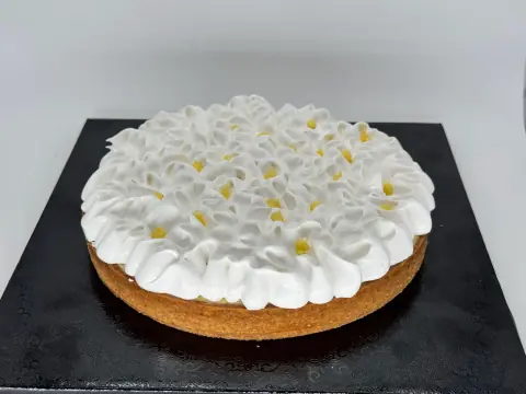 Big Lime Almond Meringue Tart - Lime almond tart shell filled with baked almond cream and fresh lime curd, topped with light, fluffy Italian meringue. Bright, slightly tangy, and perfectly balanced. Serves 6–8 people. 8 inch