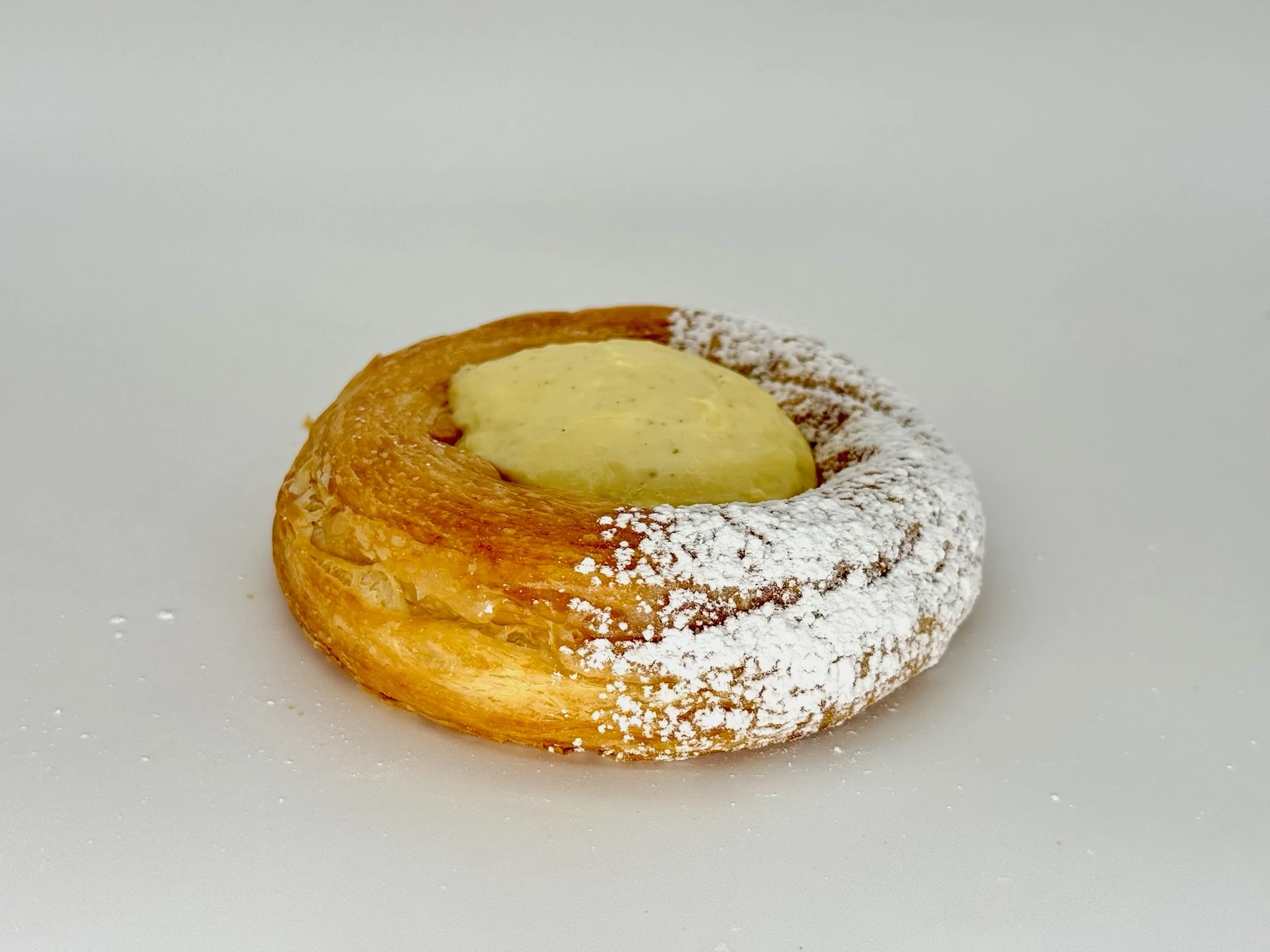 Lime Vanilla Danish - Flaky buttery puff pastry filled with silky vanilla cream and bright lime curd for a perfect balance of rich and refreshing flavors.