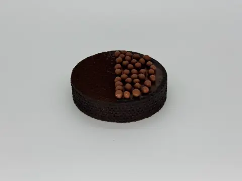 Milk Chocolate Cream Tartlet - Rich and creamy milk chocolate filling in a buttery crust for a perfectly smooth indulgence.