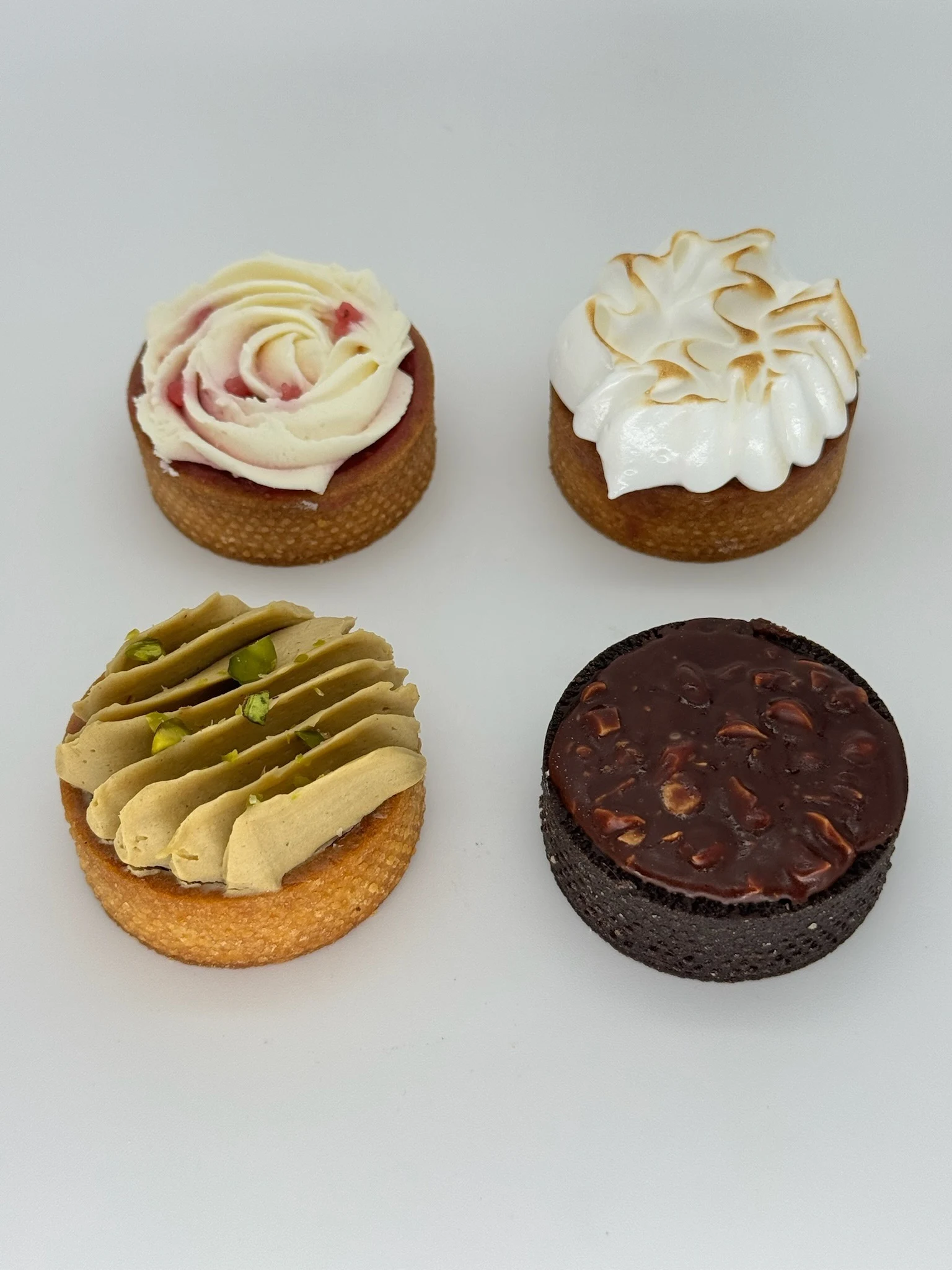 Mini Tartlet (Assorted) - Daily selection of petite tartlets — flavors rotate; ask what's fresh today.